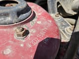 Neon right front strut tower VIN stamp